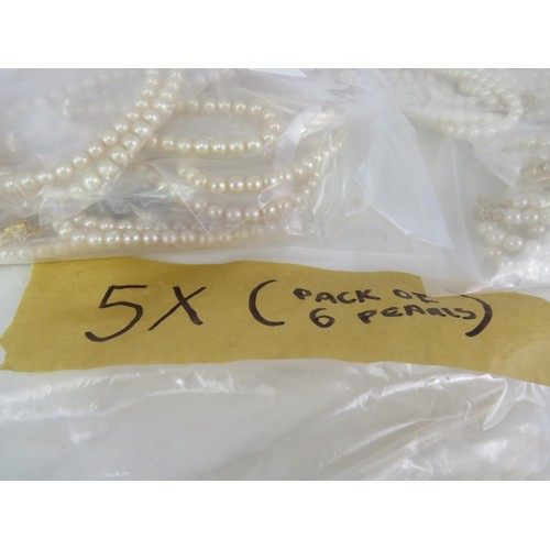 389 - FIVE BAGS OF FAUX PEARL NECKLACES