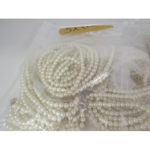 401 - FIVE BAGS OF FAUX PEARL NECKLACES