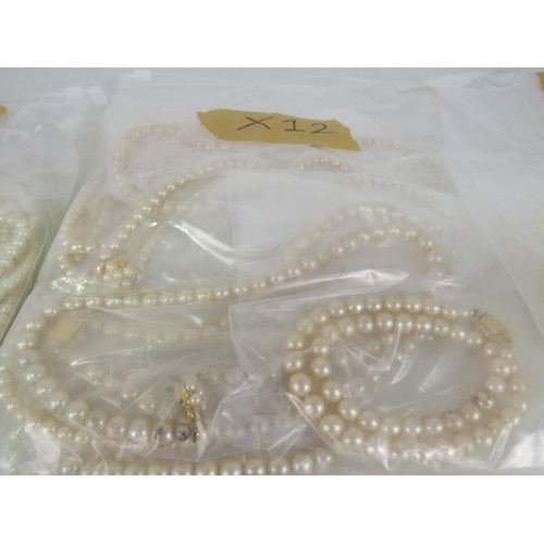 401 - FIVE BAGS OF FAUX PEARL NECKLACES