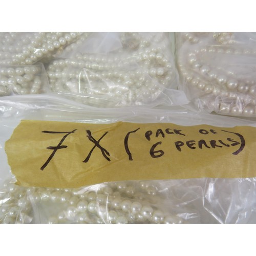 401 - FIVE BAGS OF FAUX PEARL NECKLACES