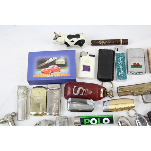 479 - 28 x Assorted Cigarette LIGHTERS Inc Novelty, Polo, Eagle, Car, Cow Etc