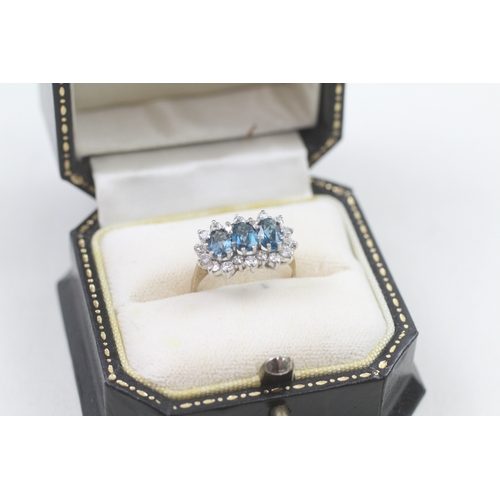 546 - 9ct gold blue topaz & cubic zirconia dress ring, claw set, including ring box (2.3g)- SIZE K