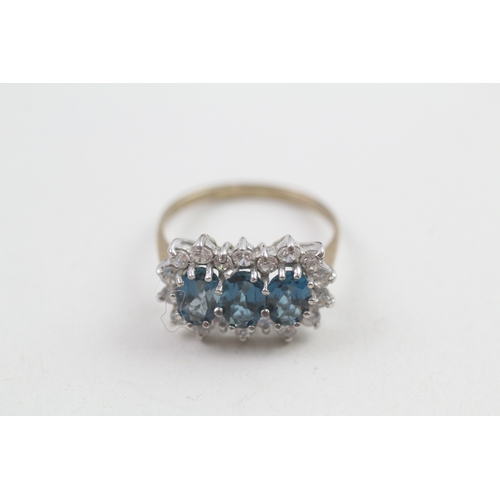 546 - 9ct gold blue topaz & cubic zirconia dress ring, claw set, including ring box (2.3g)- SIZE K