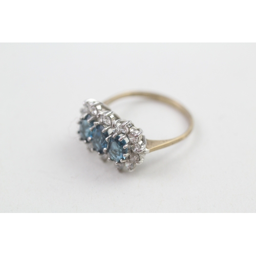 546 - 9ct gold blue topaz & cubic zirconia dress ring, claw set, including ring box (2.3g)- SIZE K