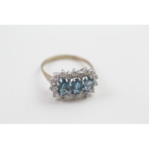 546 - 9ct gold blue topaz & cubic zirconia dress ring, claw set, including ring box (2.3g)- SIZE K