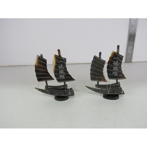 4 - Pair of Chinese carved buffalo horn sailing boat sculptures.