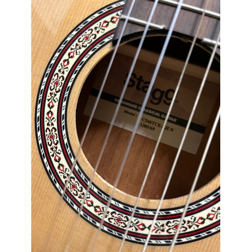 252 - Stagg acoustic and electric guitar