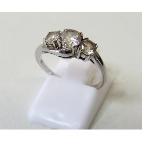 62 - 9ct White gold CZ trilogy ring size L, 2.4g - with box.