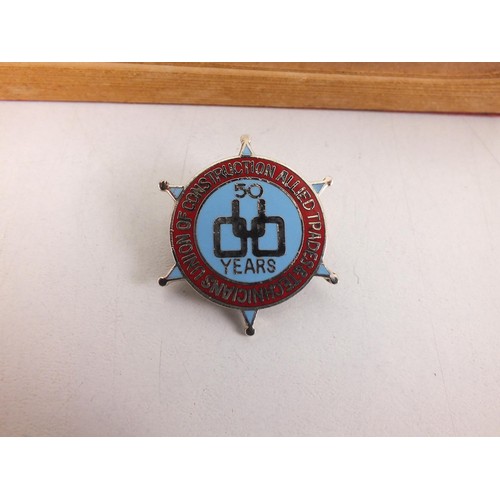 102 - Union of Construction Allied Trades and Technicians enamel badge with 1972 rules.