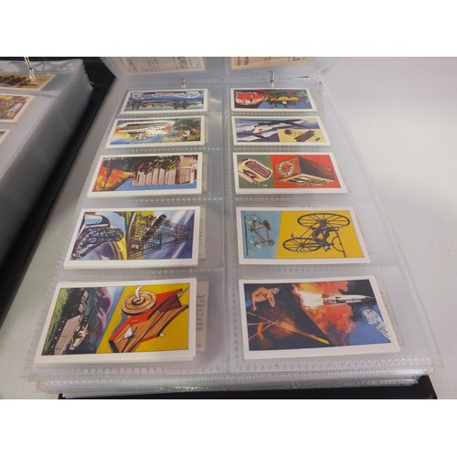 117 - Two albums of trade cards - 32 complete sets.