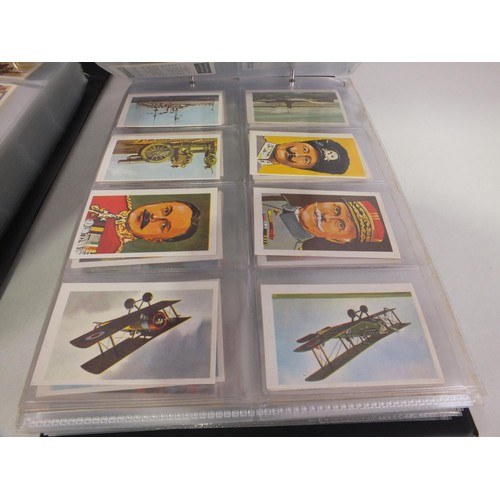 117 - Two albums of trade cards - 32 complete sets.