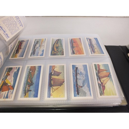 118 - Four albums of trade cards - seventy three complete sets.