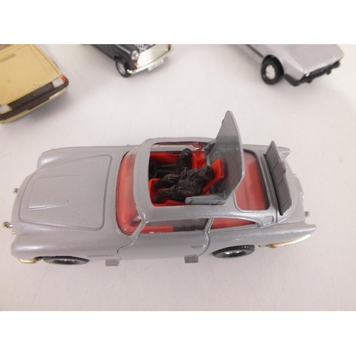 111 - Six vintage Dinky toys including James Bond 007 Aston Martin.