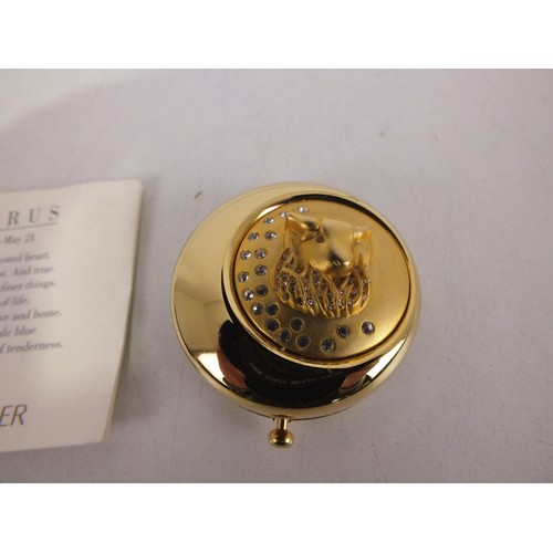 101 - Estee Lauder collectable zodiac compact 'Taurus' in velvet pouch.