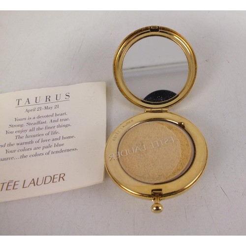 101 - Estee Lauder collectable zodiac compact 'Taurus' in velvet pouch.