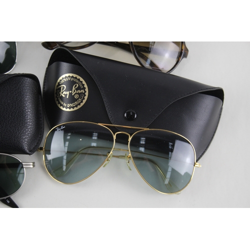 475 - Four pairs of Ray Ban Sunglasses with cases.