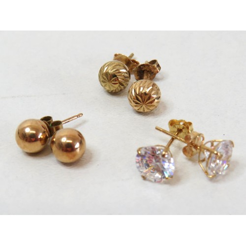 3 - Three pairs of 9ct Gold stud earrings.