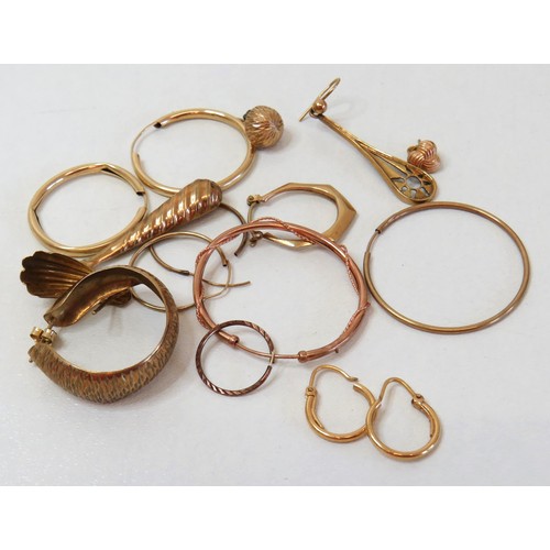 11 - 9ct Gold earrings singles and one pair of hoops.
Weight 8.2g