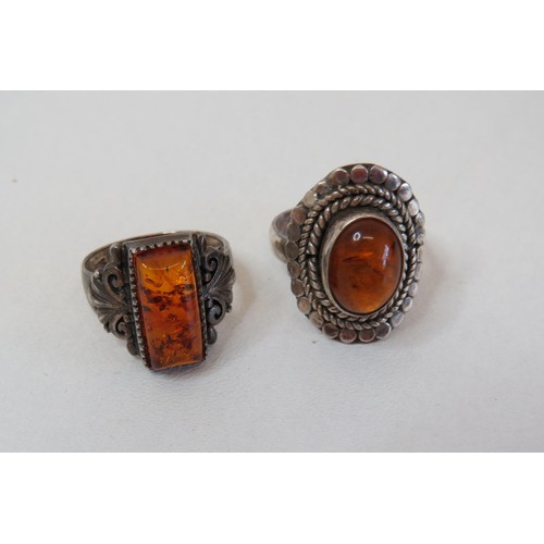 13 - Two vintage 925 silver and Amber rings.