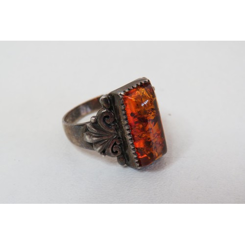 13 - Two vintage 925 silver and Amber rings.