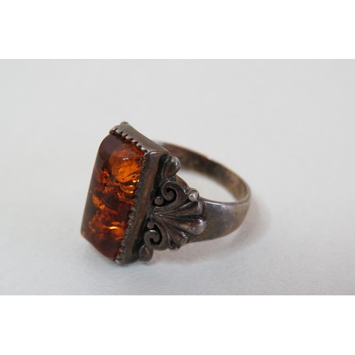 13 - Two vintage 925 silver and Amber rings.