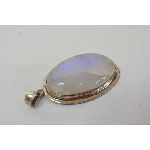 21 - Four silver mounted Gemstone pendants