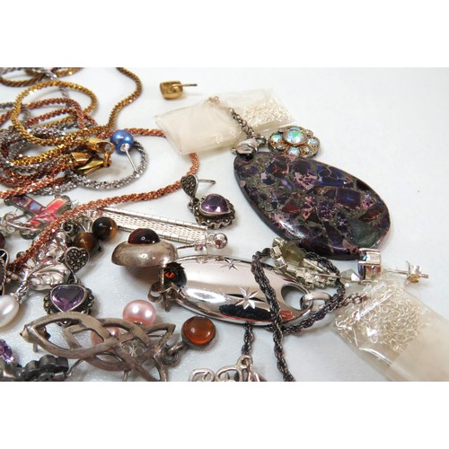 31 - Job lot of Silver Jewellery to include earrings, Necklaces, Pendants etc.
Weight 176g