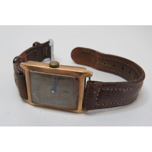 61 - Vintage Art Deco 9ct Gold cased Manual wind wristwatch with leather Strap.
Winding and working.