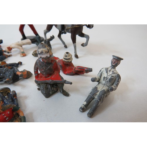 77 - Collection of assorted toy figures including Britains lead figures, phone box etc.