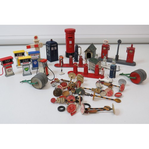 81 - Job lot of vintage lead toys including petrol pumps, Road signs, Police box etc.