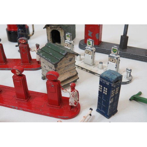 81 - Job lot of vintage lead toys including petrol pumps, Road signs, Police box etc.