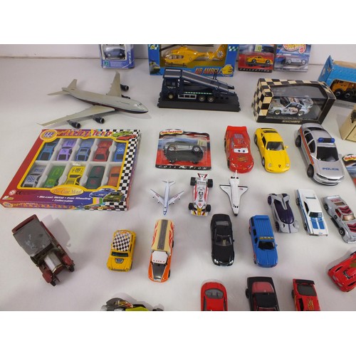 317 - Collection of boxed cars and diecast including vintage, Majorette, Hot Wheels etc.