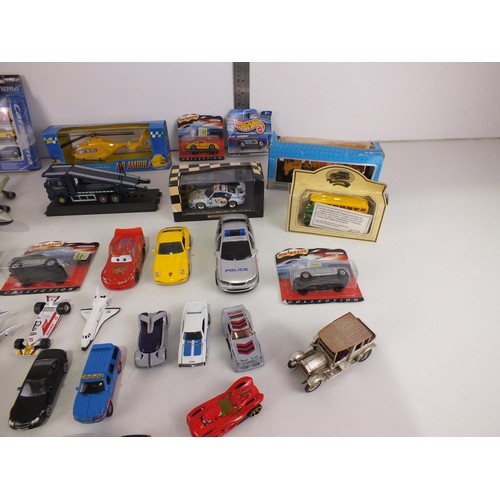 317 - Collection of boxed cars and diecast including vintage, Majorette, Hot Wheels etc.