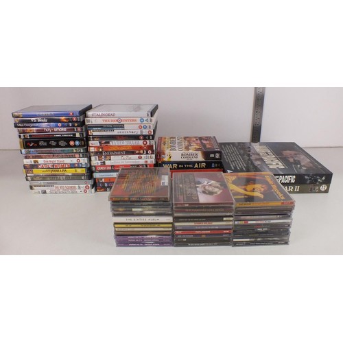 315 - Collection of DVDs and CDs including war related.