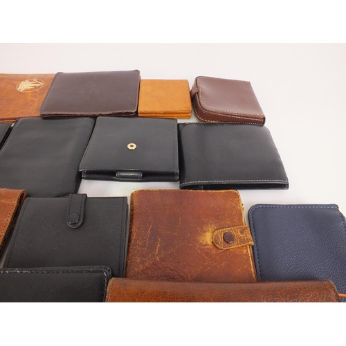 191 - Twenty nine vintage leather wallets.