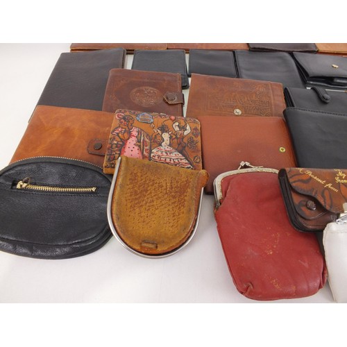 191 - Twenty nine vintage leather wallets.