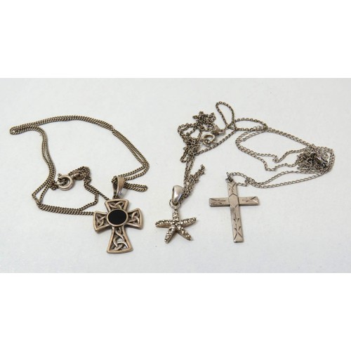 187 - Three silver necklaces - Celtic cross, crucifix and starfish.