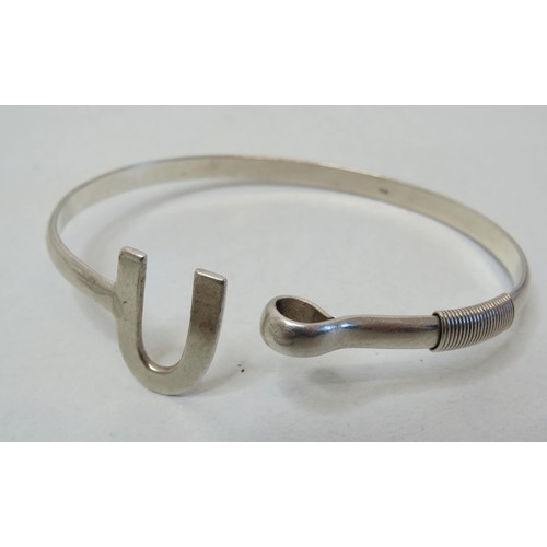 52 - Three 925 Silver bangles.
Weight 57g