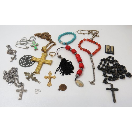 84 - Job lot of religious theme jewellery, Rosary beads, Crucifix pendants etc.