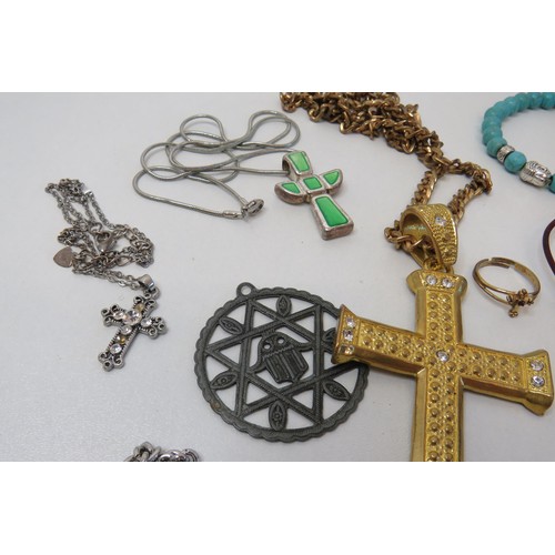 84 - Job lot of religious theme jewellery, Rosary beads, Crucifix pendants etc.