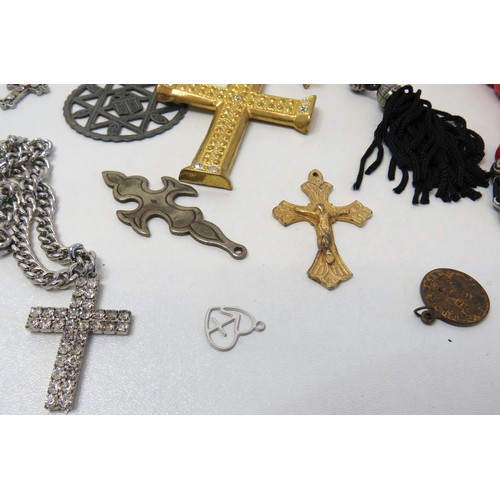 84 - Job lot of religious theme jewellery, Rosary beads, Crucifix pendants etc.