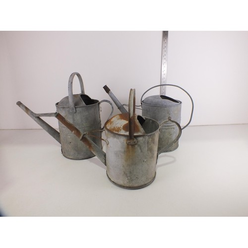 345 - Three galvanised watering cans