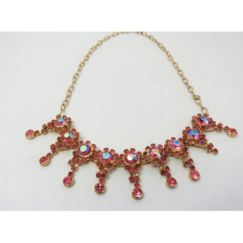 297 - Vintage Gold Tone and Aurora Pink Crystal necklace.