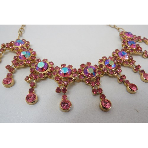 297 - Vintage Gold Tone and Aurora Pink Crystal necklace.