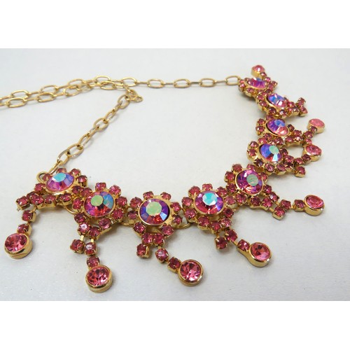 297 - Vintage Gold Tone and Aurora Pink Crystal necklace.