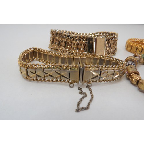 299 - Five Gold Tone bracelets including tennis bracelet.