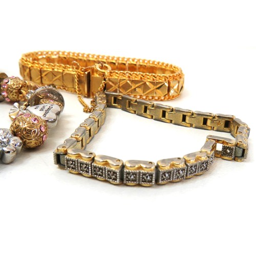 299 - Five Gold Tone bracelets including tennis bracelet.