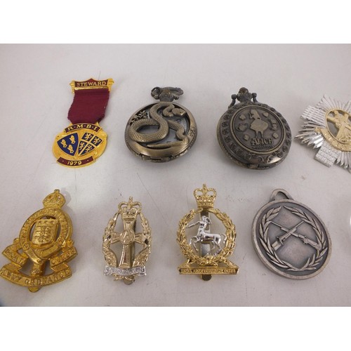 203 - Mixed lot of badges including cap badges