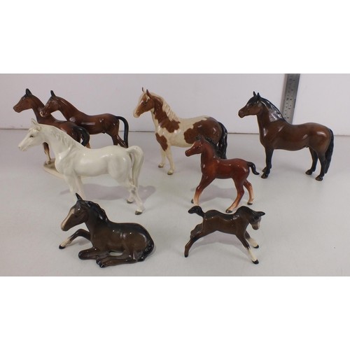 215 - Seven Porcelain horse figures to include Beswick