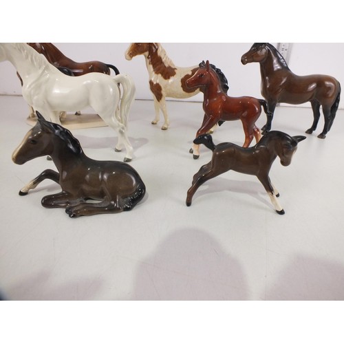 215 - Seven Porcelain horse figures to include Beswick